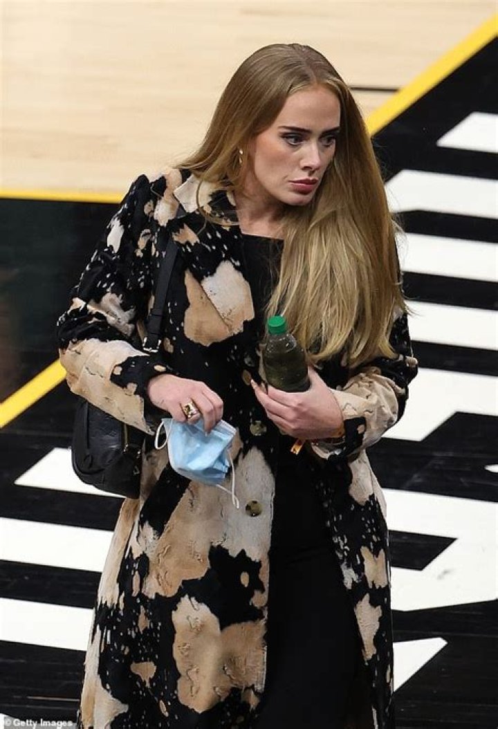 Statement-making:&nbsp;Adele donned a statement-making black coat that was stamped with bleached patches
